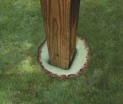 The position of the post may be adjusted for up to 10 seconds after the material has been poured into the hole. Photo: Sika