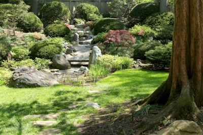 This Japanese garden uses flat river stones to symbolize a rushing stream. Photo: publicdomainpictures.net