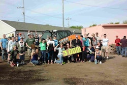 Victory Garden Blitz volunteers celebrate a record effort in 2016, bringing the total number of gardens installed to more than 3,000 since the program began. Photo: Case Construction Equipment