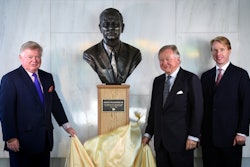 From left, the founder’s sons Mark Bamford and JCB Chairman Anthony Bamford, along with grandson Jo Bamford, the company’s group managing director of global accounts, unveil the new bust of Joseph Cyril Bamford, founder of JCB. Photo: JCB