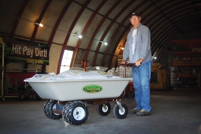 With a 750-pound capacity, Overland Carts’ 9-cubic-foot wagon-style hopper swings on a hinge to be lifted and dumped. Photo: Overland Carts