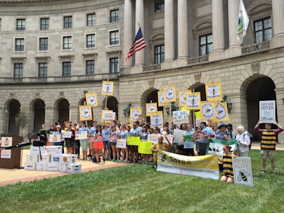 Activists rally outside of EPA’s headquarters to urge the banning of bee-toxic pesticides. Photo: Keep The Hives Alive Tour