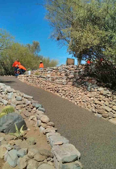 Porous Pave was eager to demonstrate that its pour-in-place material could be applied uniformly on inclines as well as level sites. Photo: Porous Pave