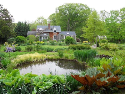 This view of the farm pond can be seen from the iron gazebo near its edge. Photo: Andrew Grossman Landscape Design