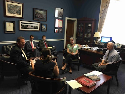 Members of Associated Landscape Contractors of Colorado talk with U.S. Rep. Mike Coffman, a Republican member of the state’s congressional delegation. Photo: Jill Odom
