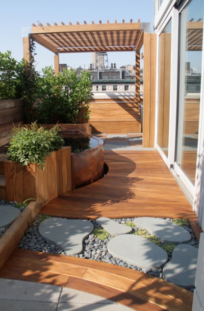 A custom copper hot tub is tucked away neatly on this Upper West Side terrace. Photo: C. Myers