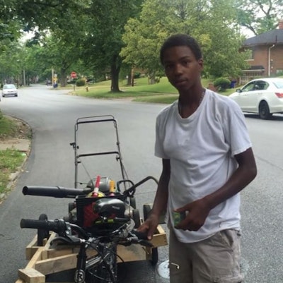 Daron Taylor fashioned a trailer he could attach to his bike to enable him to take grass-cutting jobs farther from home. Photo: deonshotme/Instagram