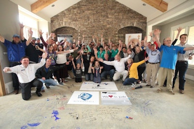 Ewing employees, customers and manufacturer partners celebrate as the St. Jude Dream Home nears completion. Photo: Ewing Irrigation & Landscape Supply