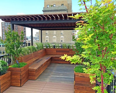 Built-in seating is ideal for hiding extra storage. Photo: Amber Freda