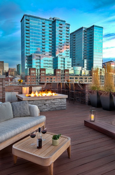 Fire features are popular for heating up a chilly evening in Denver. Photo: Elevate By Design