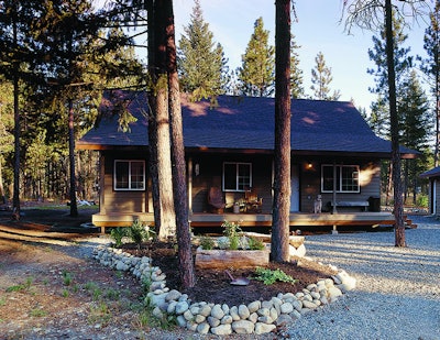 Another example of firewise landscaping keeps flammable vegetation further away from the house. Photo: Firewise.org