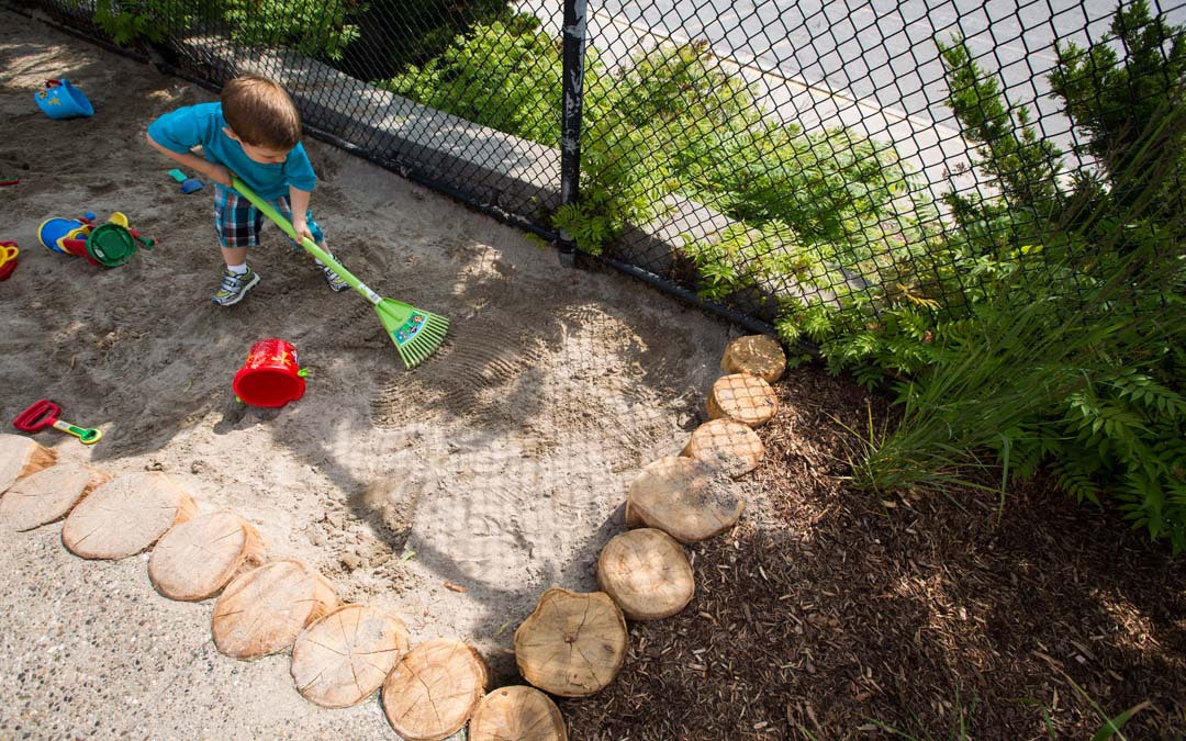 How to design a natural playground for kids to enjoy Total Landscape Care