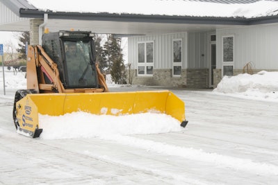 To reduce the need for expensive salting, use a pusher that removes snow and ice as completely as possible on the first pass. Photo: Arctic Snow and Ice Products