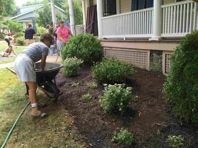 Chapel Valley Landscape employees join other volunteers in working on a Salvation Army women’s shelter as part of a day of service sponsored by the Baltimore chapter of the Building Owners and Managers Association. Photo: Chapel Valley Landscape Co.