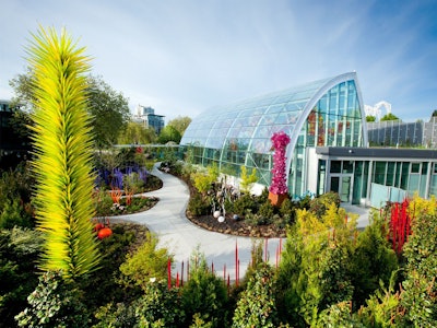 In creating a space to exhibit the celebrated glass works of sculptor Dale Chihuly, the designers clearly thought the living garden should delight visitors in its own right while functioning as the setting for magnificent artwork. Photo: Chihuly Garden and Glass