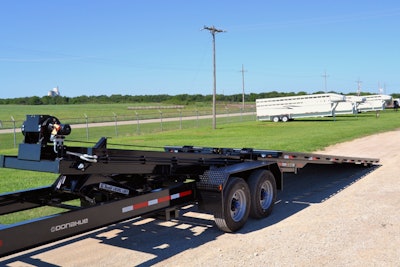 The trailer is lowered under gravity’s power and is pulled back on to the frame by a hydraulic wench. Photo: Donahue Manufacturing