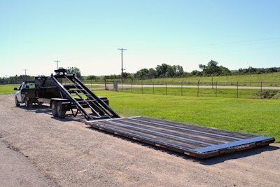 The detachable platform’s ground clearance is only 8 inches, making it simple to drive equipment on to or off the bed. Photo: Donahue Manufacturing