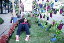 One of the benefits of the parklets created is having a green space for people to relax in. Photo: Mig Rod/Flickr