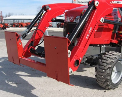 The new adapter enables a Massey Ferguson loader to use skid steer attachments. Photo: Worksaver Inc.
