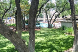 Texas Custom Turf installed this artificial grass landscaping at Westwood Country Club in Austin, Texas. Photo: PRNewsFoto/Synthetic Grass Warehouse Inc.