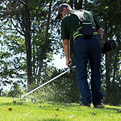 The 82-volt brushless string trimmer saves in operating costs by eliminating the need for oil, fuel, spark plugs, or air filters. Photo: Greenworks