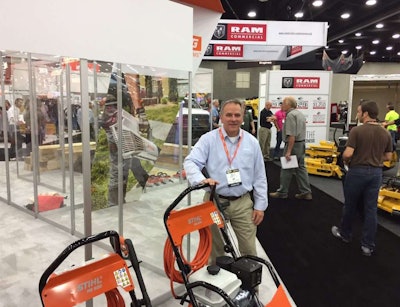 STIHL’s Kent Hall talks with landscape contractors about the most powerful of the company’s new pressure washers, the RB 800, during GIE+EXPO this week. Photo: David Rountree