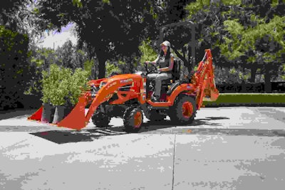 The LA340 Swift-Tach loader for the BX23S can be removed or attached without leaving the operator station. Photo: Kubota