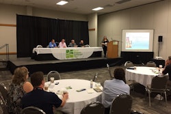Pam Berrios, president-elect of the National Hispanic Landscape Alliance, moderates a panel discussion for equipment dealers at GIE+EXPO. Photo: David Rountree