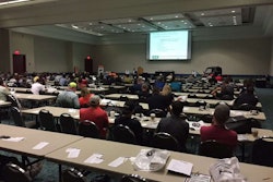 Organizers of the first ‘UTV University’ at GIE+EXPO were well-pleased with the turnout. Here, speaker Ty Bello talks with dealers about how to maximize sales of utility vehicles. Photo: David Rountree