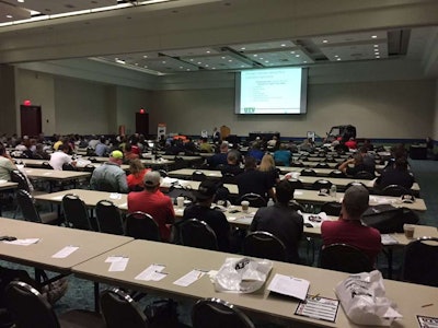 Organizers of the first ‘UTV University’ at GIE+EXPO were well-pleased with the turnout. Here, speaker Ty Bello talks with dealers about how to maximize sales of utility vehicles. Photo: David Rountree