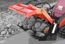 The new grapple is designed to retain rocks while allowing dirt to be sifted out of the bucket. Photo: Worksaver Inc.