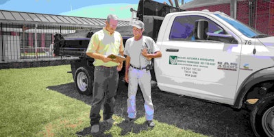 Michael Hatcher (left) credits loyal and hard-working employees for his success. Photo: Marc Burford