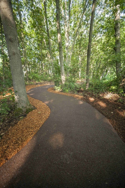 The walking path runs adjacent to the Charles River in Wellesley, Massachusetts. Photo: Porous Pave