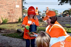 LandCare employees brought family members along to join in the volunteer effort. Photo: LandCare