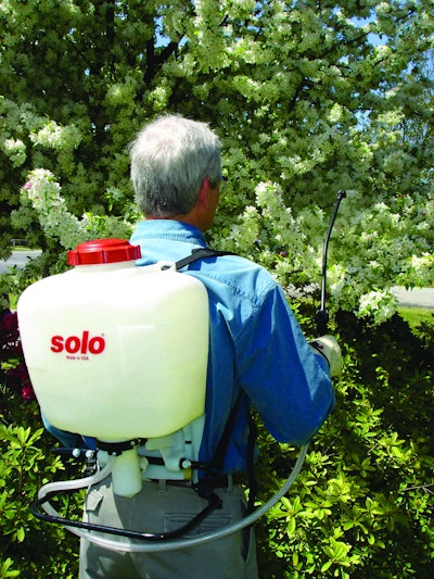 man-spraying-for-bugs