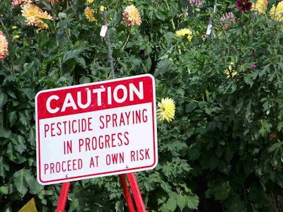 Without the proper protection, landscapers can be exposed to toxic chemicals. Photo: jetsandzeppelins/Flickr