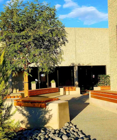 Workers now have a pleasant outdoor space with seating at the Ocean Point office space. Photo: Heaviland Landscape Management