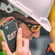 Construction Worker Talking on his Smart Phone