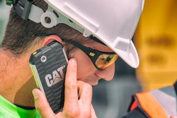 Construction Worker Talking on his Smart Phone
