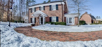 If possible, use sand rather than salt on pavers near turf and plants. Photo: Bruss Landscaping Inc.