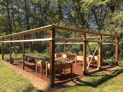 DeerBusters fencing can be used to protect a garden or an entire yard. Photo: JV