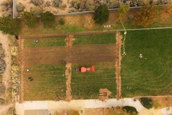 New Mexico State University researchers are conducting an irrigation efficiency study at the city of Albuquerque’s Paradise Meadows Park. While half of the park will use a traditional sprinkler-type watering system (right), NMSU will oversee the other half of the park, on which a subsurface drip irrigation system has been installed (left). Photo: New Mexico State University