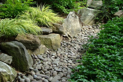Natural stone can be used in a number of ways. Jan Johnsen outlines the methods in her book The Spirit of Stone: 101 Practical & Creative Stonescaping Ideas for Your Garden. Photo: Jan Johnsen