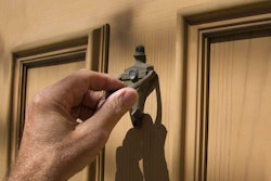 A Man Knocking on Someone's Front Door