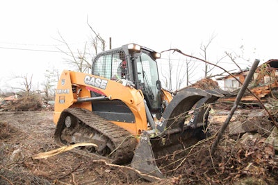 Volunteers demolished 17 houses and cleared an additional 13 properties of tornado debris at no charge. Photo: CASE Construction Equipment