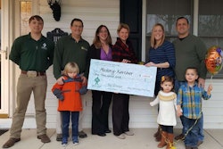 From left, Trent Grus, a sales representative for Green Giant Lawn & Tree Care; Green Giant owner Dan Rothermel Jr.; Heather Gift, administrative and marketing assistant with Green Giant; the company’s co-owner, Beth Rothermel; the landscape company owners’ son, Parker; and contest winners Mallory and Glenn Kercher and their two children. Photo: Green Giant Lawn & Tree Care