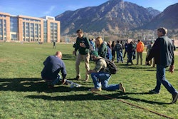 Students study the different type of sprinkler heads and the optimal psi needed. Photo: Jill Odom