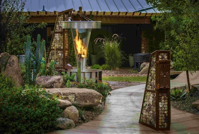 This fire feature combines the elements of both fire and water for an interesting visual. Photo: Mountainscapers Landscaping