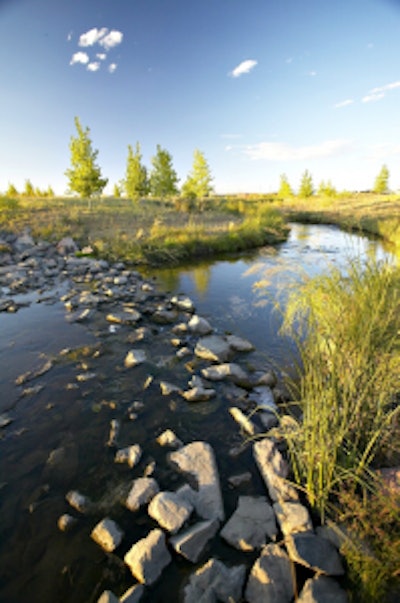 Westerly Creek ran through a pipe under the Stapleton International Airport runway, but has since been restored by BrightView with native, drought-tolerant plants around it. Photo: BrightView