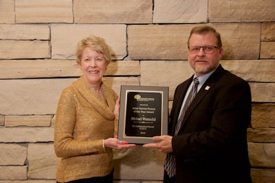 Pictured is Michael Womochil receiving the John Garvey Person of the Year Award. Photo: ALCC